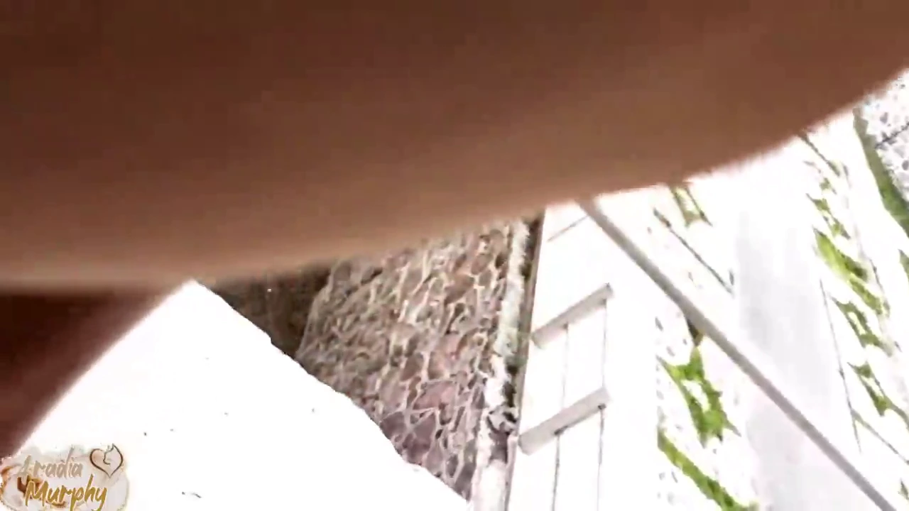 A steamy couple caught in the act on their balcony, visible to their neighbors porn video